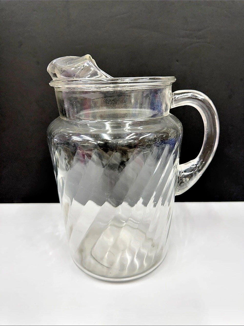 Indiana Glass Optic Swirl / Swirl ice-guard pitcher, large clear version